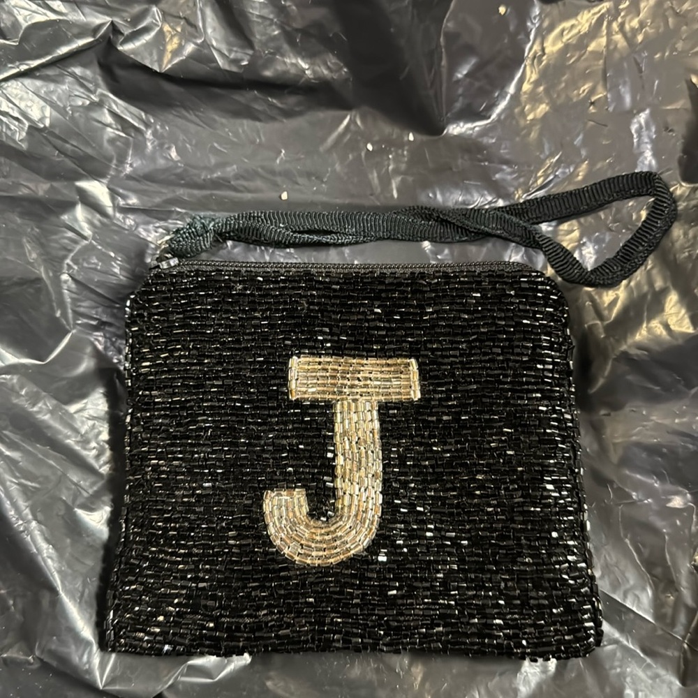 Black beaded “J” wristlet